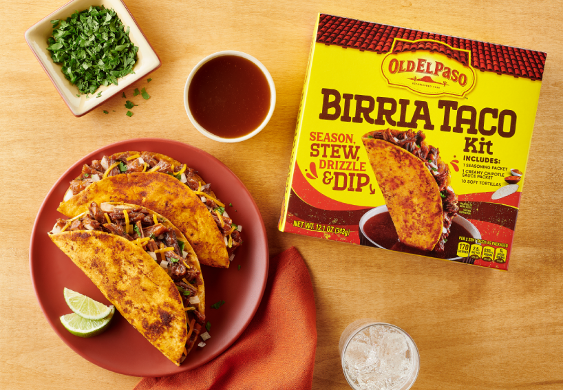 Old El Paso Birria Taco Kit Prepared Package - A colorful and appetizing plate of tacos is served with a bowl and cup of salsa, showcasing a delicious Mexican dish ready for a flavorful dining experience.